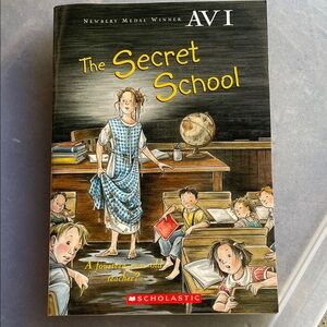 Scholastic The Secret School Book with Yellow and Blue Cover